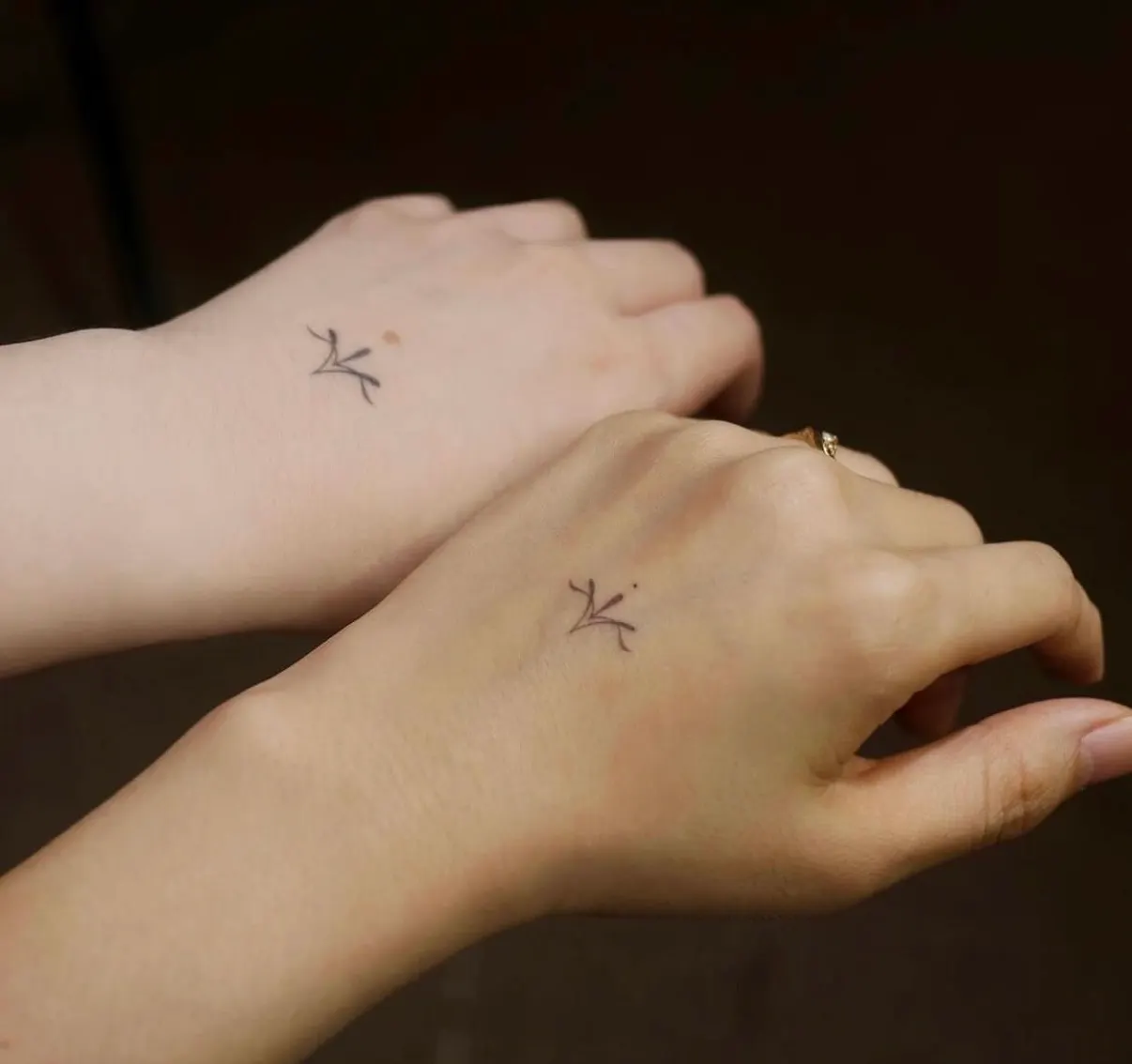 Fine line hand poke tattoo by Alma Studio, Brighton