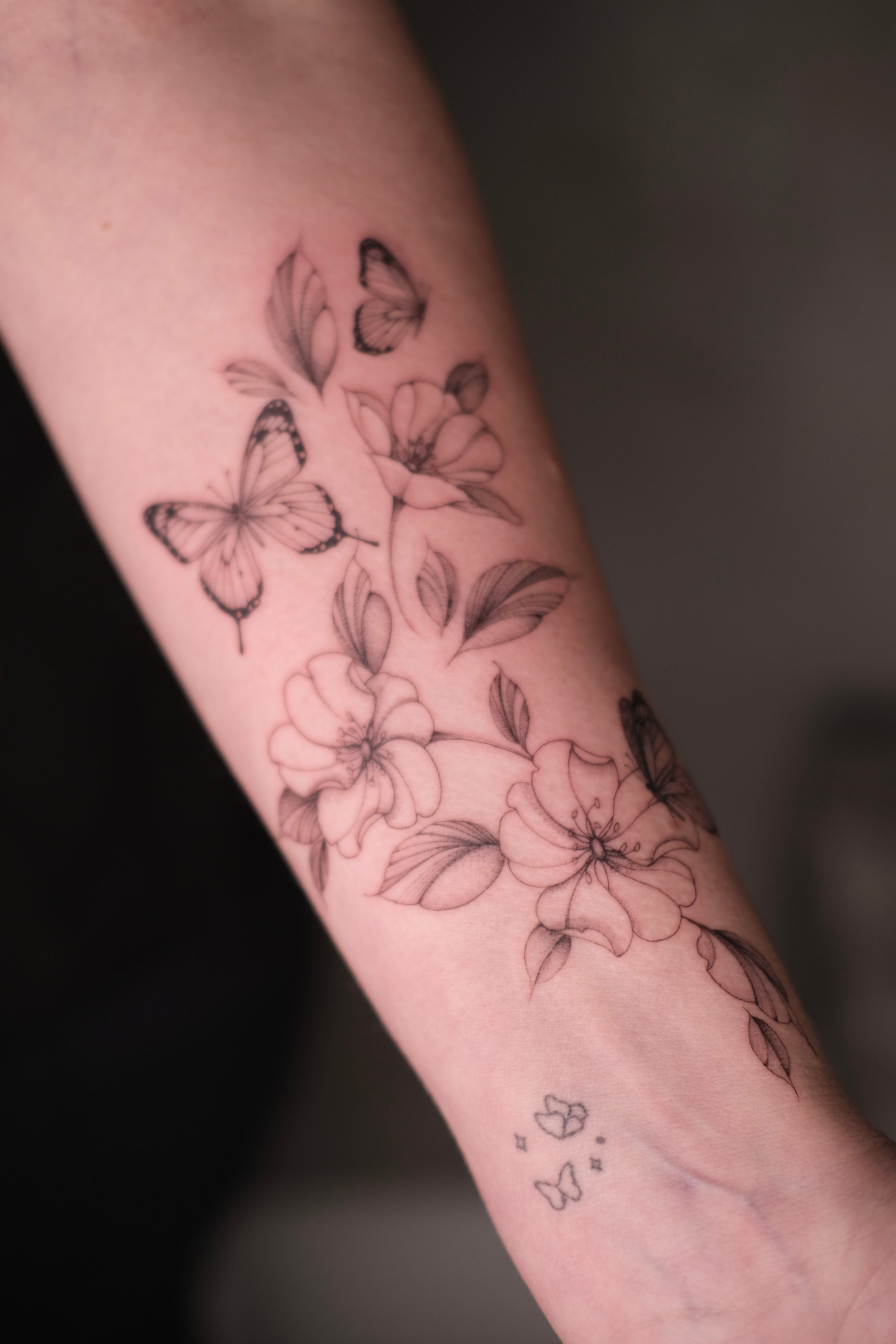 Fine line botanical tattoo by Alma Studio, Brighton