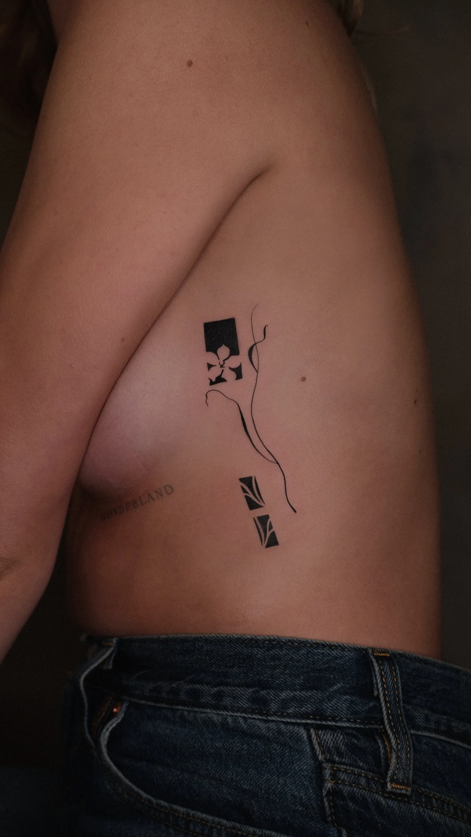 Fine line black & grey tattoo by Alma Studio, Brighton