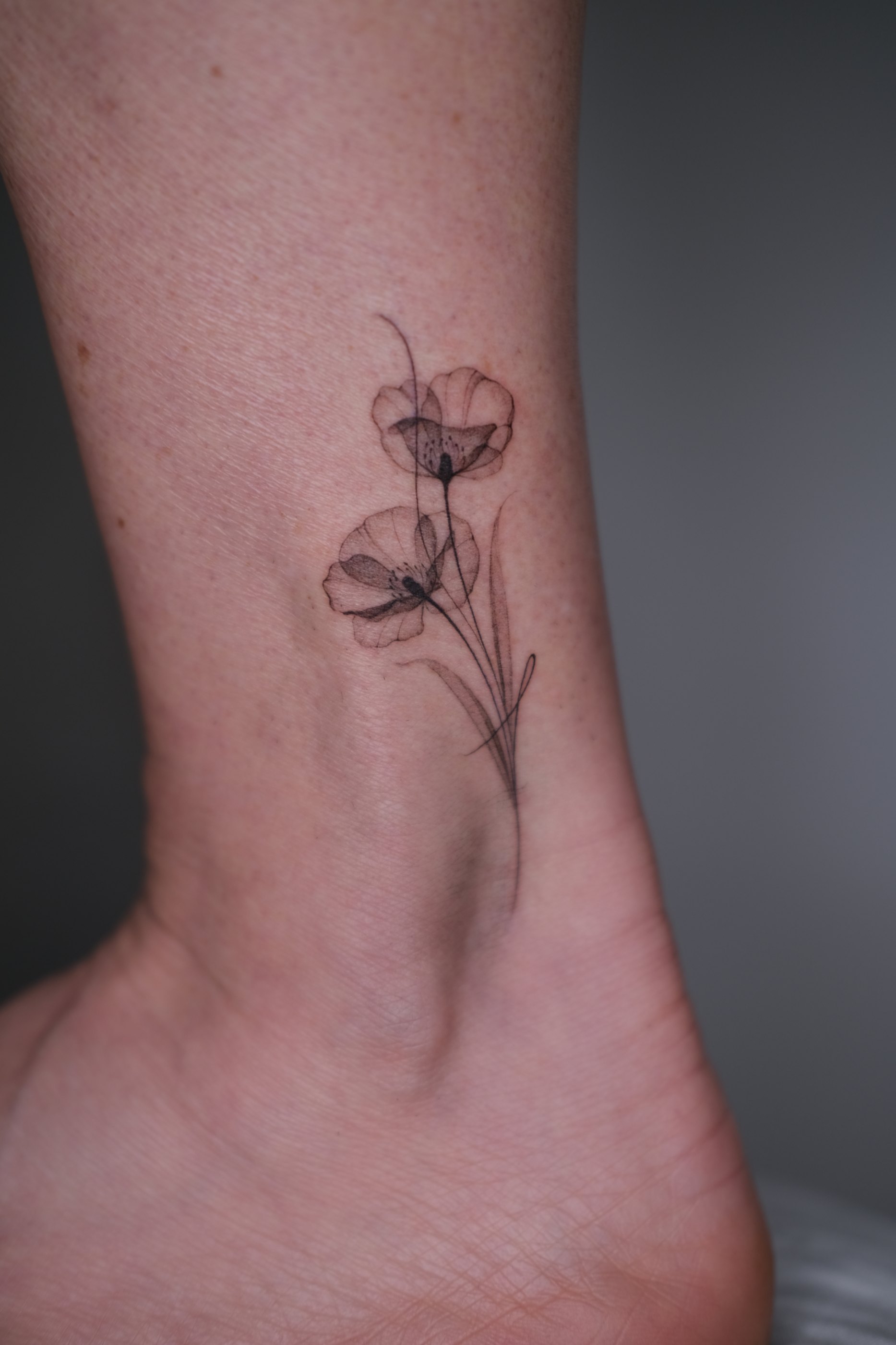 Fine line botanical tattoo by Alma Studio, Brighton