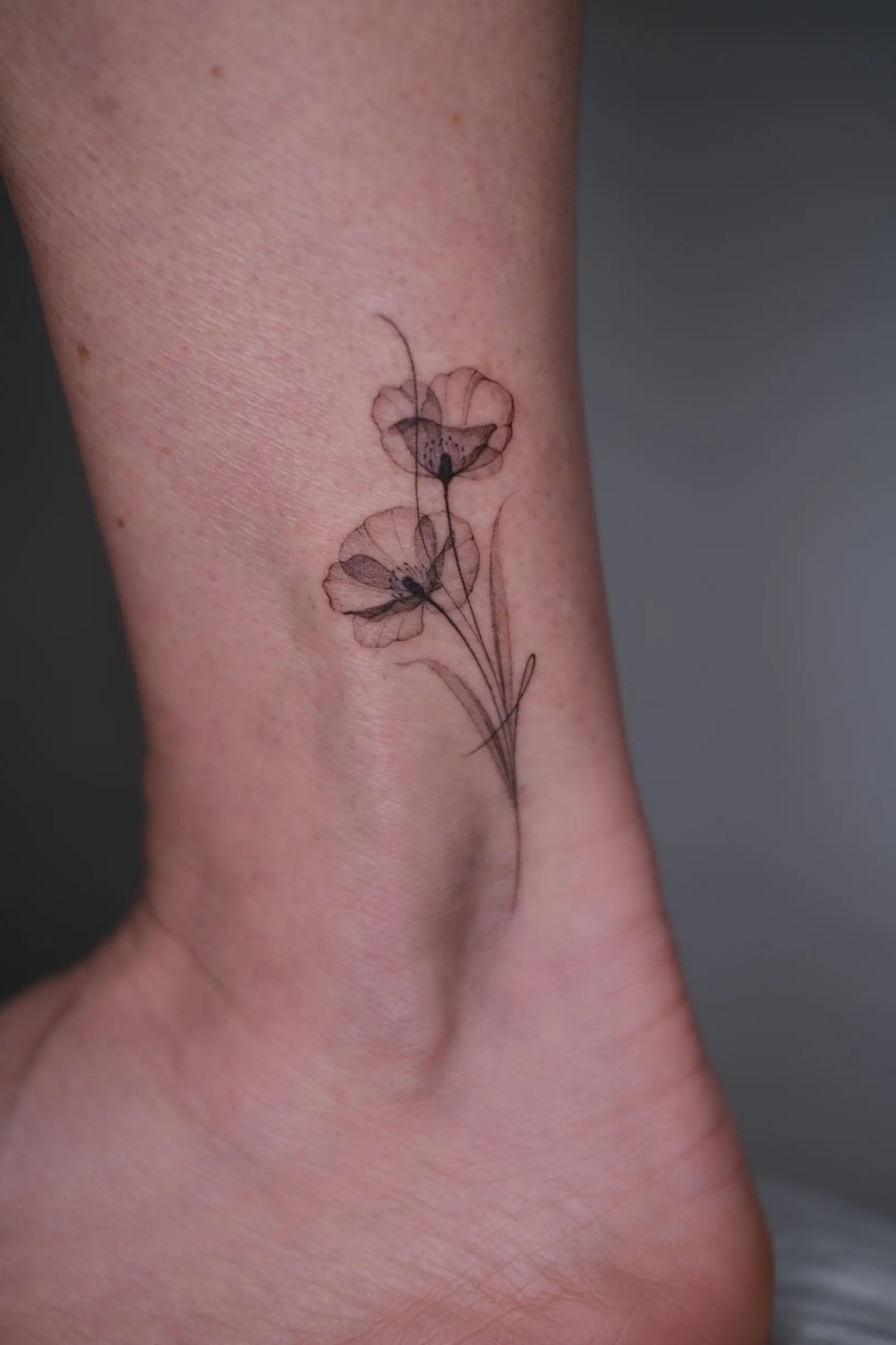 Fine line botanical tattoo by Alma Studio, Brighton