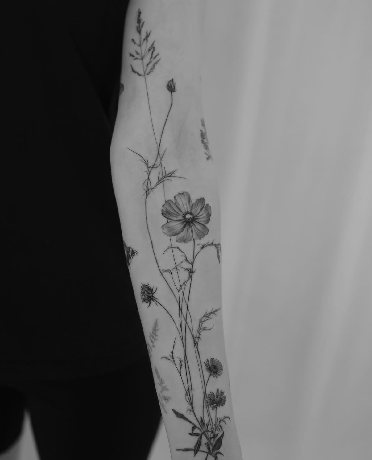 Fine line botanical tattoo by Alma Studio, Brighton