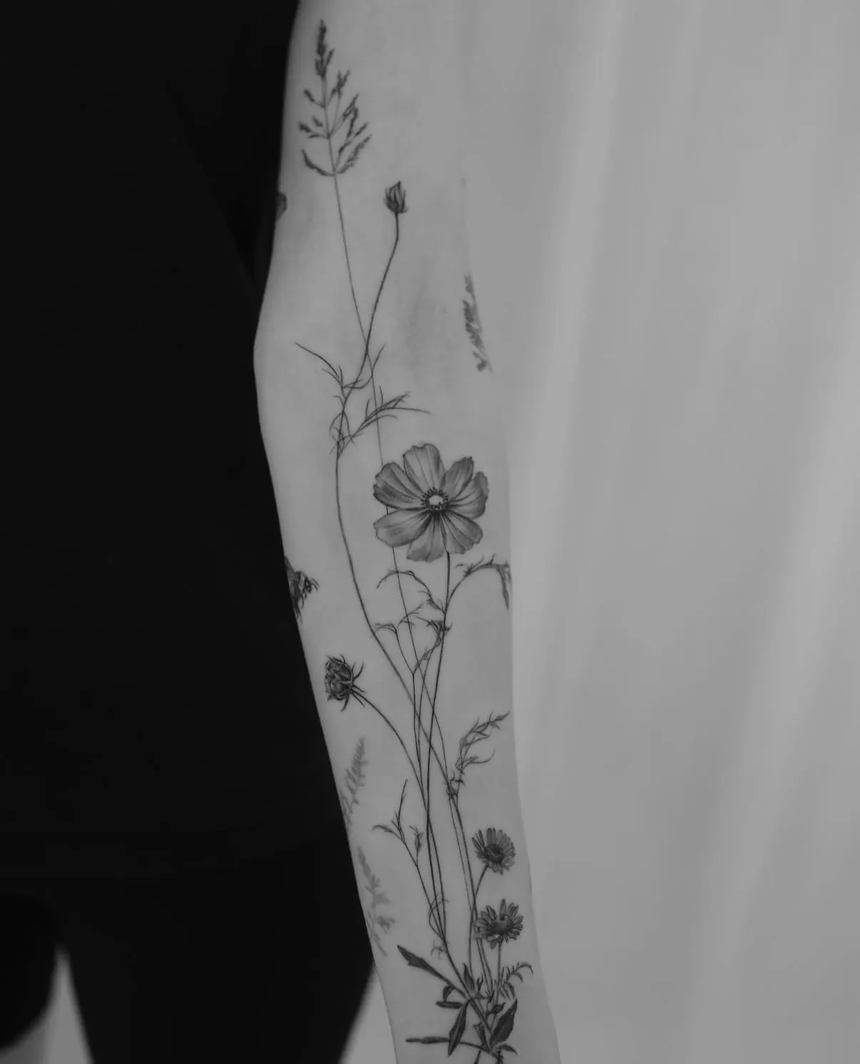 Fine line botanical tattoo by Alma Studio, Brighton