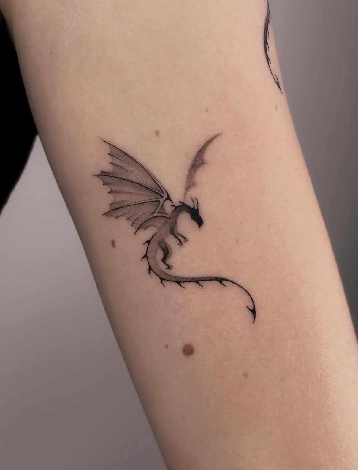 Fine line fantasy tattoo by Alma Studio, Brighton