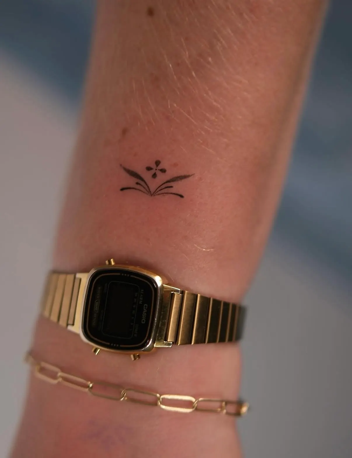 Minimalist hand poke tattoo by Alma Studio, Brighton
